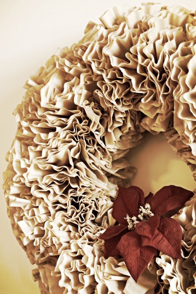 {a thrifted wreath covered with a coffee filter (or two), served with a side of hot glue gun burns..}